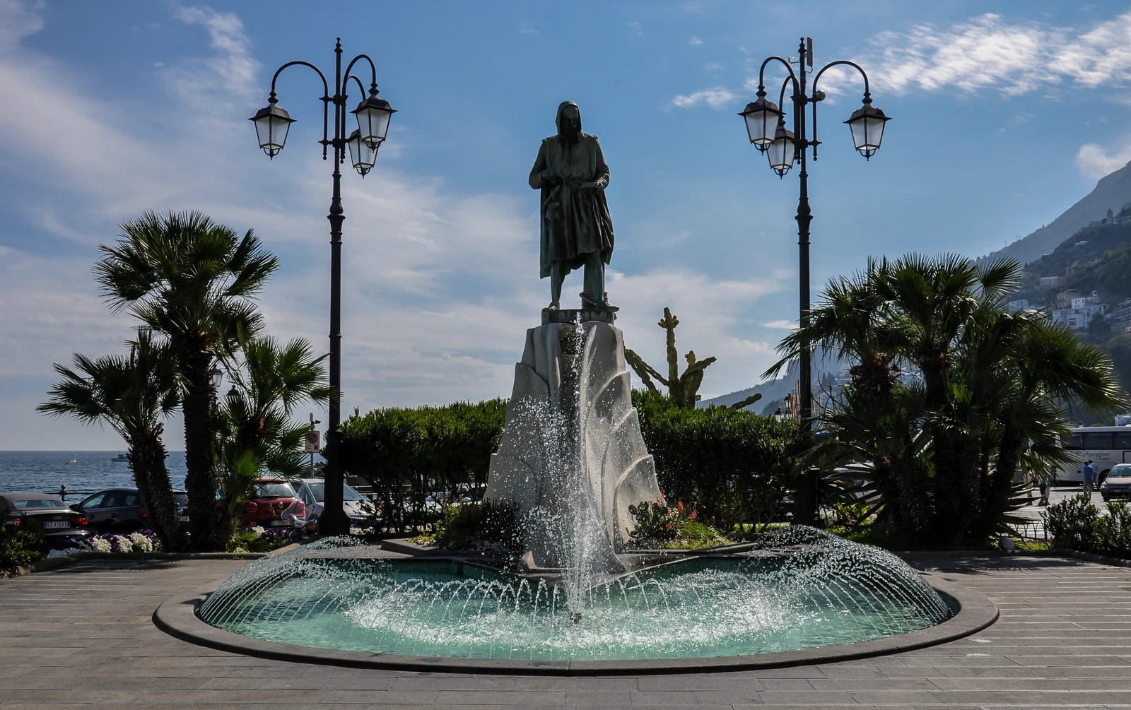 Piazza Flavio Gioia in Amalfi with the fountain and nearby bus stop area