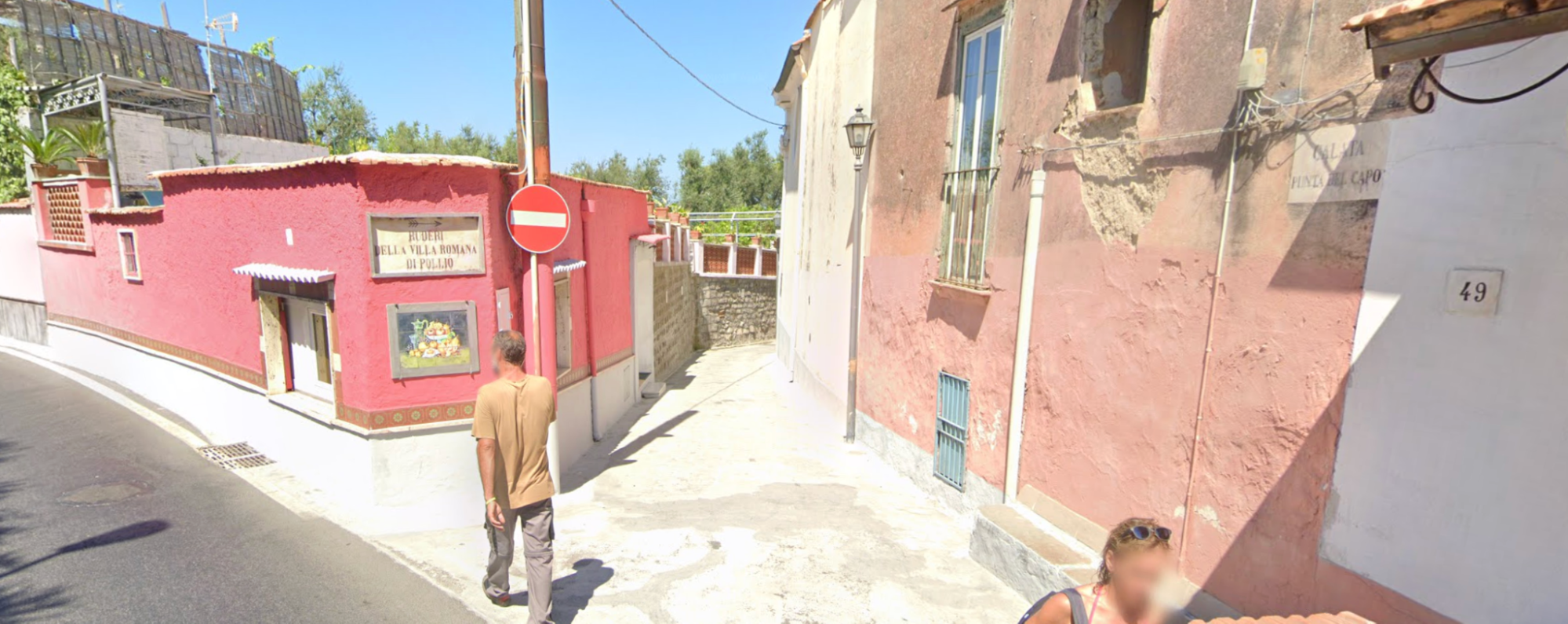 Street view of the pedestrian lane entrance at 49 Via Capo in Sorrento