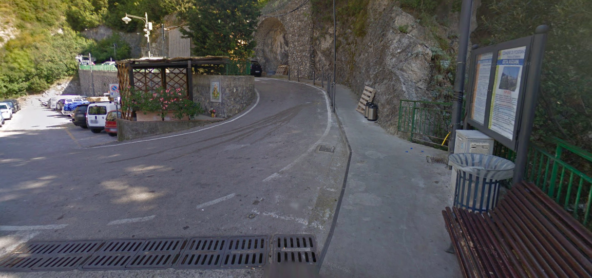 Stone steps ascending through Nocelle streets toward the bus stop