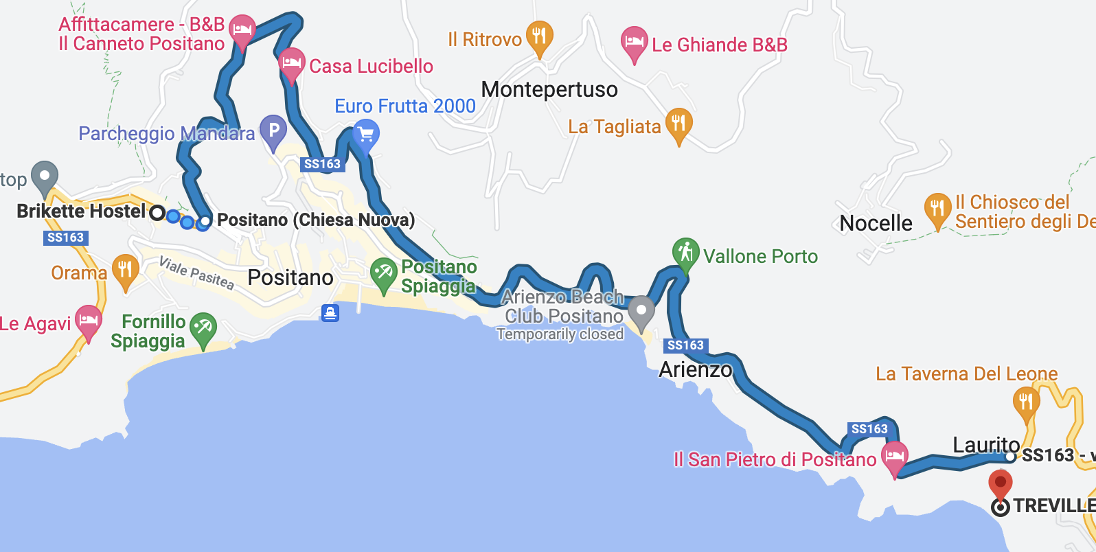 Spiaggia Grande (Positano main beach) seen from above with the village rising behind the shoreline