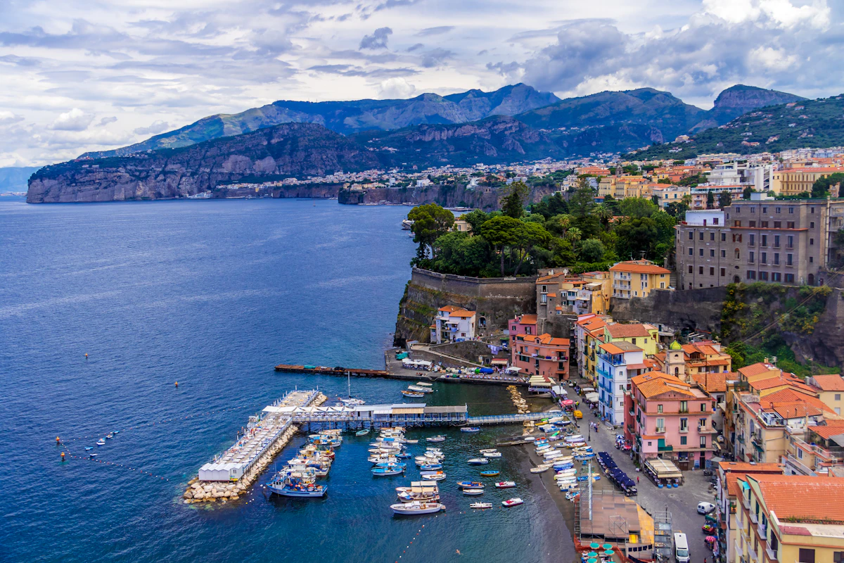 Salerno ferry port with boats and the coastline beyond